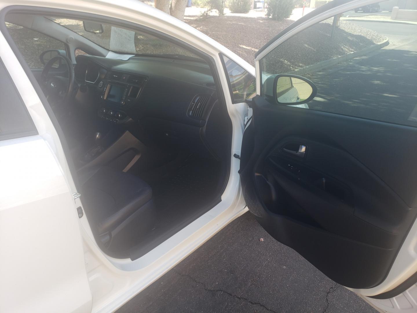 2013 Kia Rio ex (KNADN4A33D6) with an 1.6L L4 DOHC 16V engine, 6-Speed Automatic transmission, located at 323 E Dunlap Ave., Phoenix, AZ, 85020, (602) 331-9000, 33.567677, -112.069000 - 2013 Kia Rio EX,......A Must See!!... No accidents,.... Ice cold AC. The car is gorgeous inside and out. Power windows, Power door locks, Stereo/ CD Player, Phone sync, Bluetooth, Backup camera, Satellite compatible, navigation, Beautiful Black interior with Black leather seats in near perfect condi - Photo#12